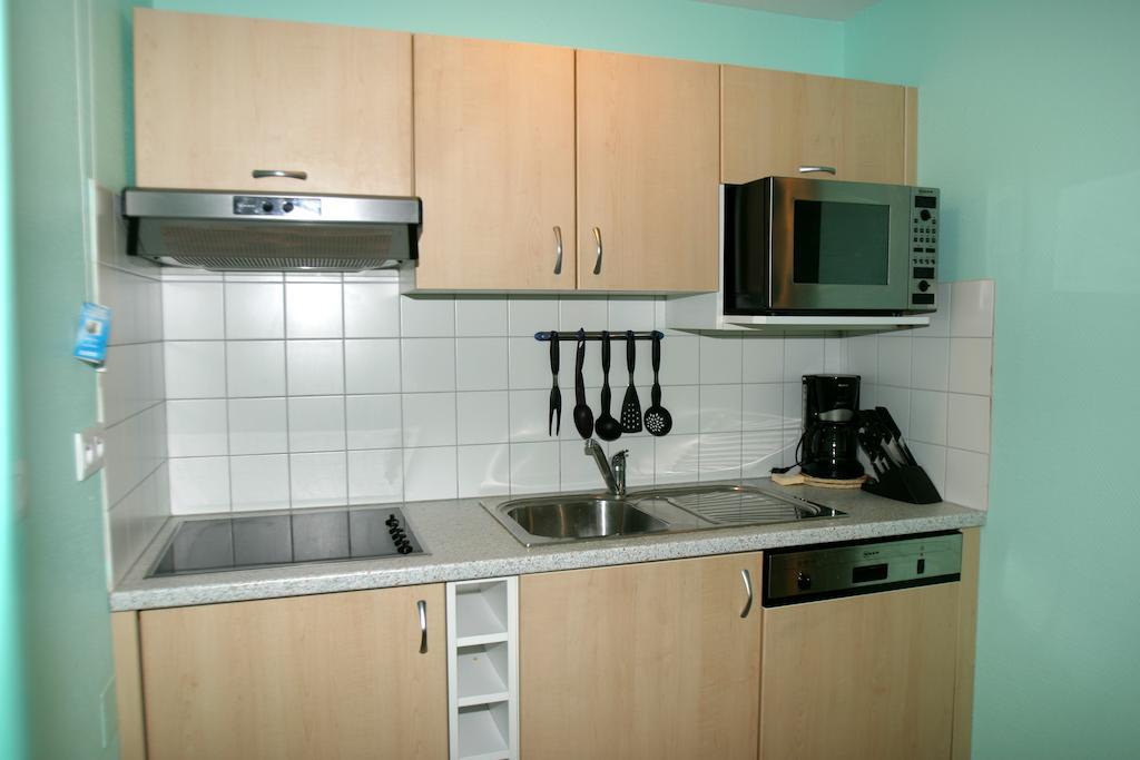 Arbizonloc Apartment Guchen Bilik gambar